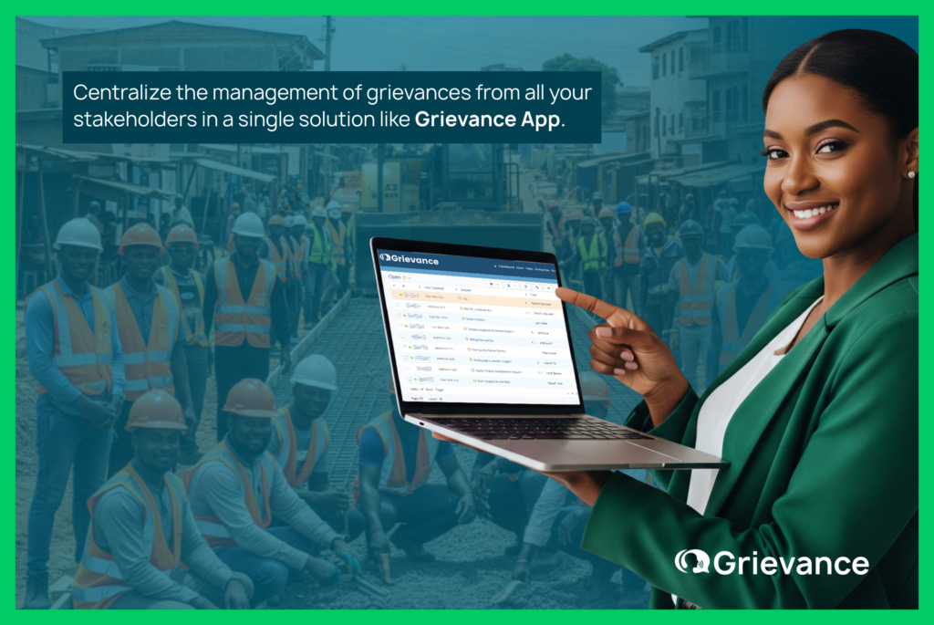 Grievance App Demonstrating Centralized Multi Project Grievance Management Professional woman showing Grievance App interface on laptop, representing centralized management of multi-project grievances on large infrastructure projects