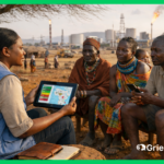 An NGO field officer presents a digital grievance redress mechanism dashboard on a tablet to Turkana community members affected by an oil infrastructure project in northern Kenya, illustrating community complaint management in action with Grievance App.