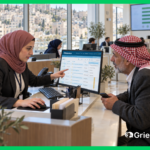 Citizen complaint system in Jordan: a civil servant shows a citizen his complaint status on a Grievance App dashboard