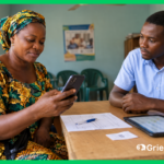 Grievance redressal mechanism in action — woman submitting a complaint on her phone while a field officer tracks the case on a tablet